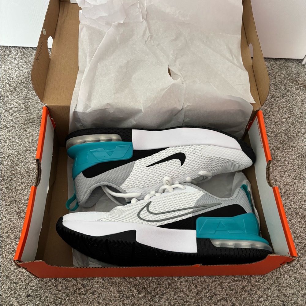 Nike White and Blue Sneakers with Modern Design